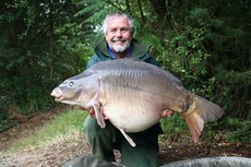 Wet and happy, after stalking this stunning Mirror. As I walked down to the shallow end of the lake, I found two fish sending u
