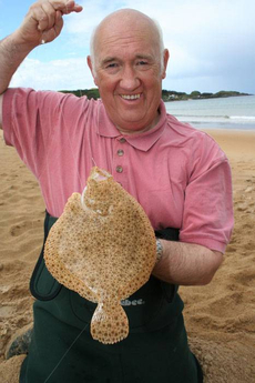 Norman Dunlop of the Irish Central Fisheries Board with a beach-caught Turbot