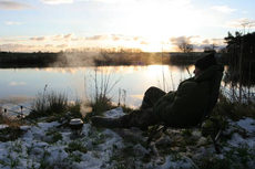 Watching and Waiting, as dawn breaks over a wintry East yorkshire gravel pit