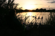Watching and waiting, as the sun goes down Linear fisheries lovely Hardwick lake, Oxfordshire.