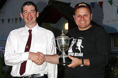 Steve Souter collecting his trophy.